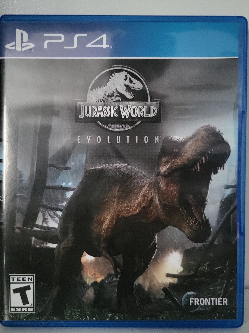 Jurassic World Evolution PS4 Game - Black/Dark Brown Cover
